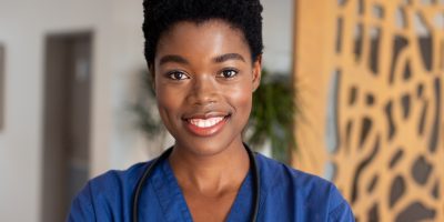 Portrait of happy female african american doctor with stethoscope